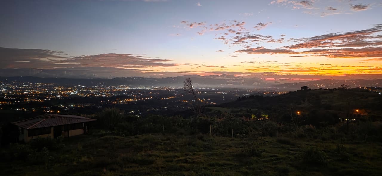 Sunset over the pastures and slopes of El Cerro